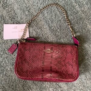 Coach Nolita 19 Exotic.  Burgundy crocodile embossed leather bag.